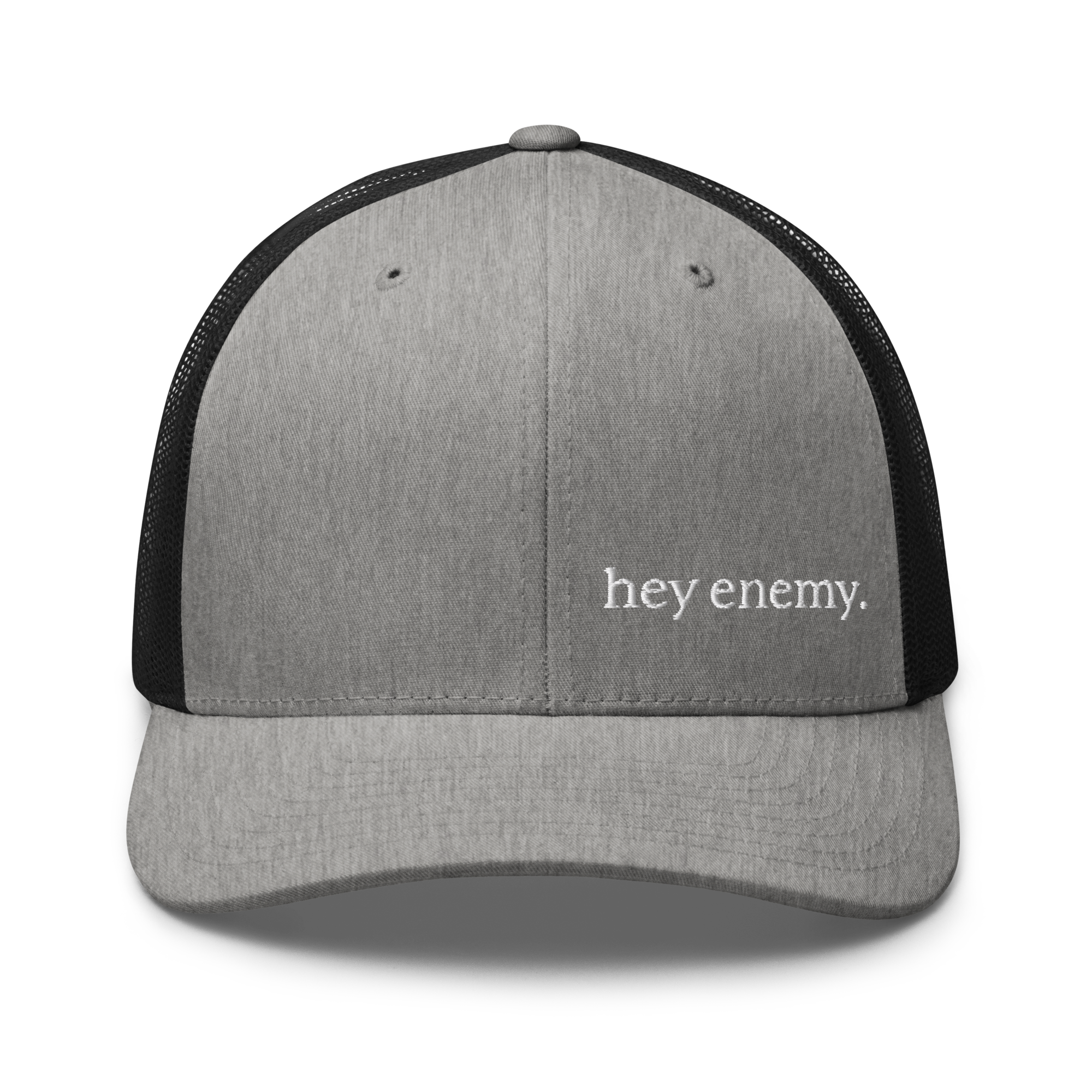 Featured image for “hey enemy Embroidered Trucker Cap”